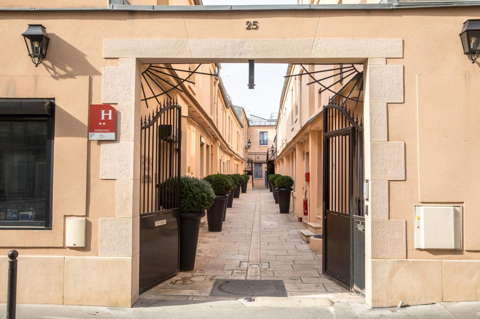 Hotel De L'Horloge Paris Exterior foto