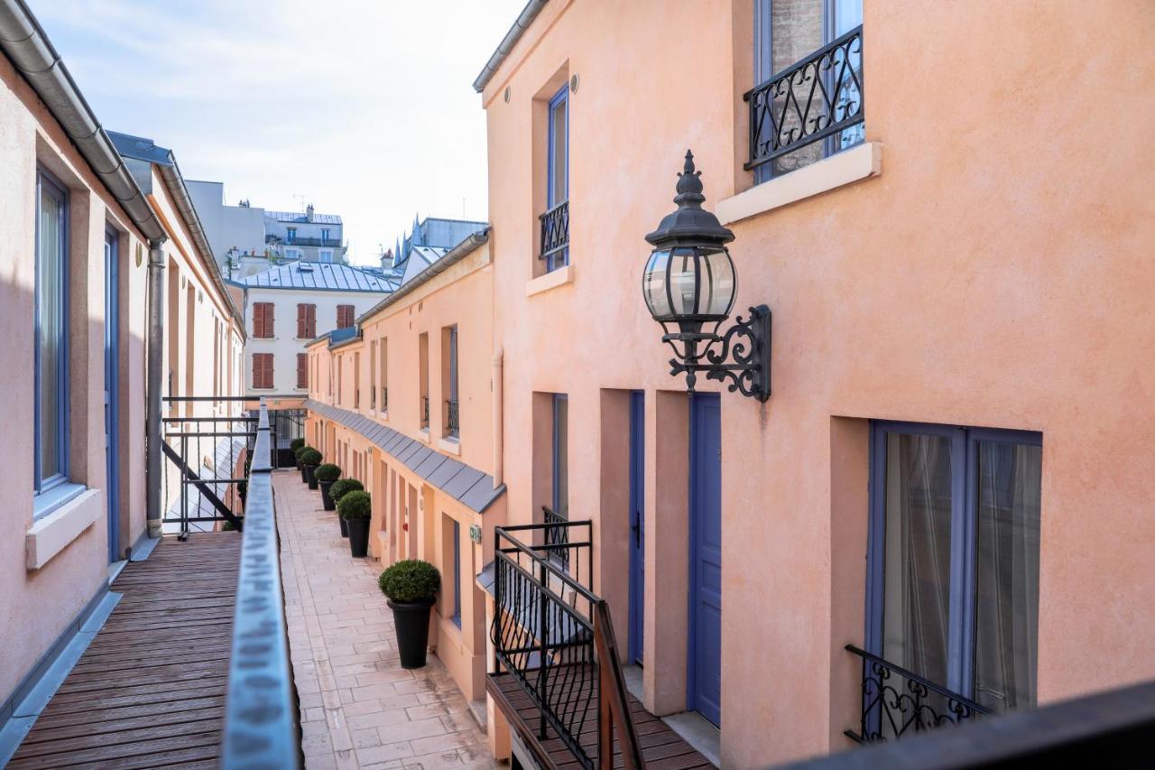 Hotel De L'Horloge Paris Exterior foto